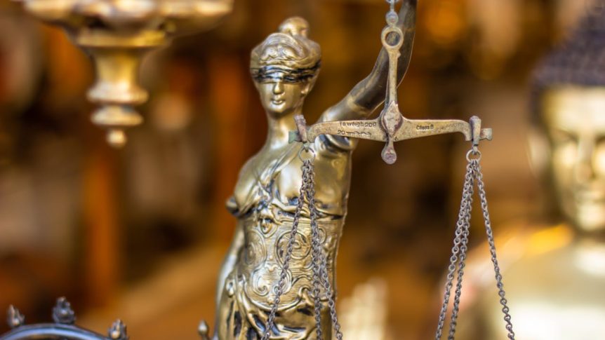 Photo by Jaiju Jacob: https://www.pexels.com/photo/close-up-of-justice-symbolic-figurine-6593883/